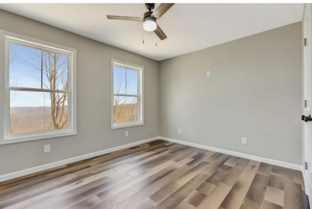 2582 Gap Rd, Altamont, TN 37301 - unfurnished room with ceiling fan, baseboards, and wood finished floors