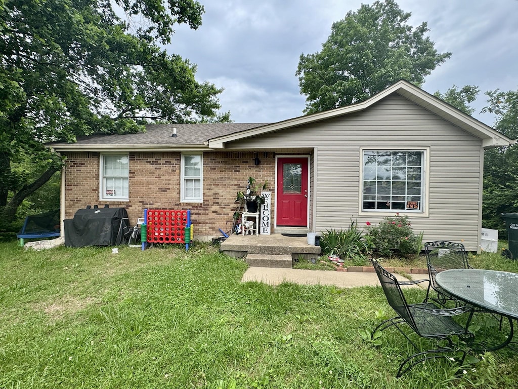 407 Marshall Stuart Dr, Dickson, TN 37055 - view of front of home featuring a front yard and brick siding