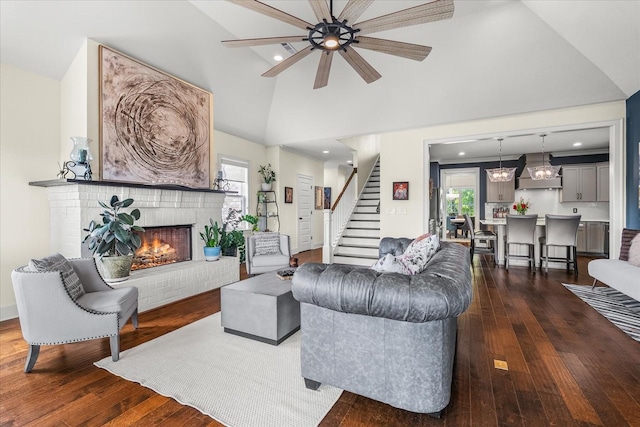 429 Finnhorse Ln, Franklin, TN 37064 - living area with stairway, ceiling fan, dark wood finished floors, a brick fireplace, and recessed lighting