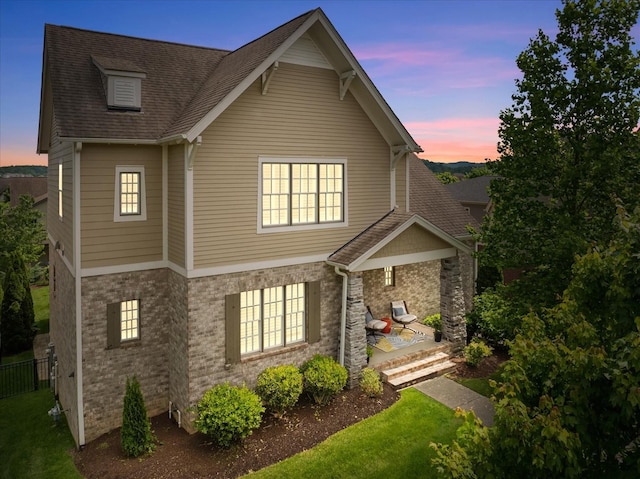 429 Finnhorse Ln, Franklin, TN 37064 - view of front of home featuring brick siding, a shingled roof, and covered porch