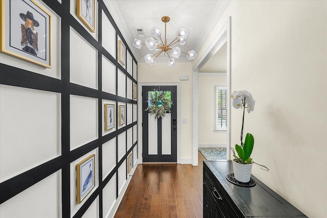 429 Finnhorse Ln, Franklin, TN 37064 - entryway with dark wood-type flooring, a chandelier, and crown molding