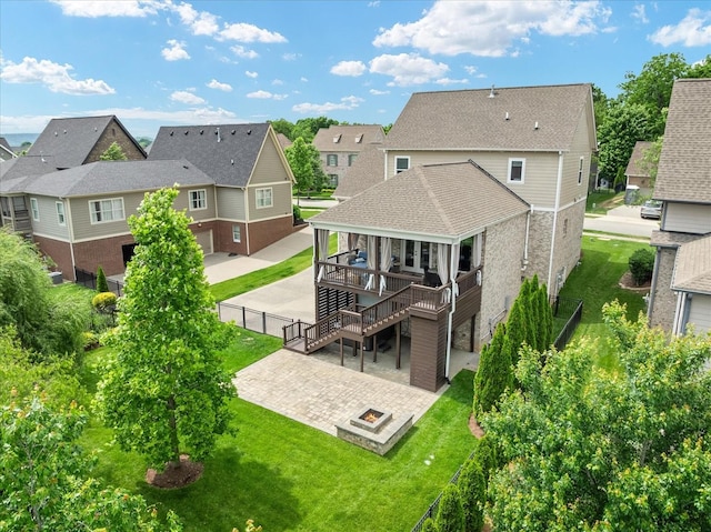429 Finnhorse Ln, Franklin, TN 37064 - rear view of property featuring a fire pit, a residential view, stairs, and a deck