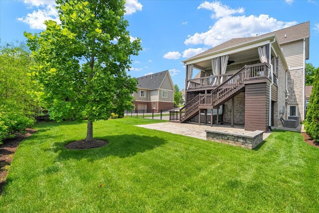 429 Finnhorse Ln, Franklin, TN 37064 - rear view of property with a patio area, stairway, central AC unit, stone siding, and roof with shingles