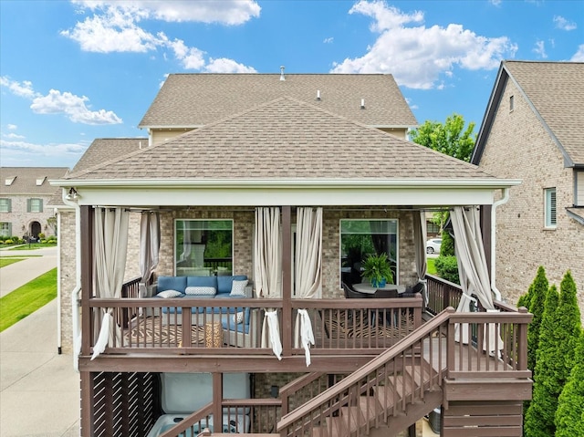 429 Finnhorse Ln, Franklin, TN 37064 - rear view of house featuring a shingled roof, an outdoor living space, a gazebo, and brick siding
