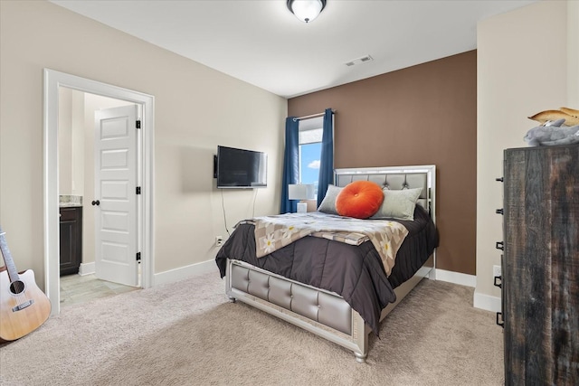 429 Finnhorse Ln, Franklin, TN 37064 - bedroom with light colored carpet, baseboards, and ensuite bath
