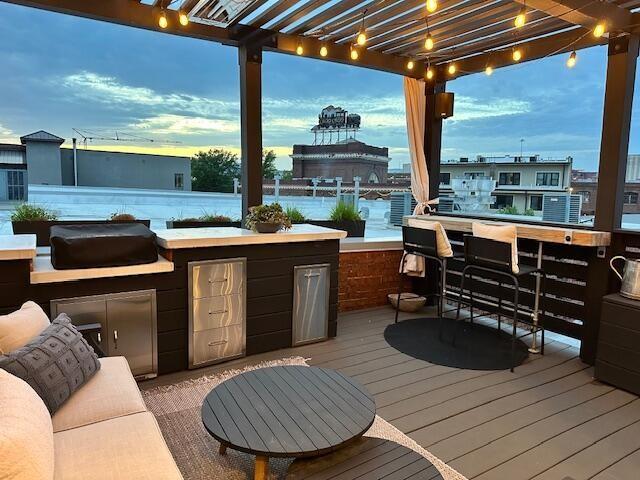 55 E Main St # 208, Chattanooga, TN 37408 - wooden terrace featuring a pergola and an outdoor bar