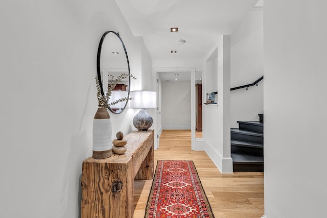 55 E Main St # 208, Chattanooga, TN 37408 - hall with light wood-type flooring, stairs, and baseboards
