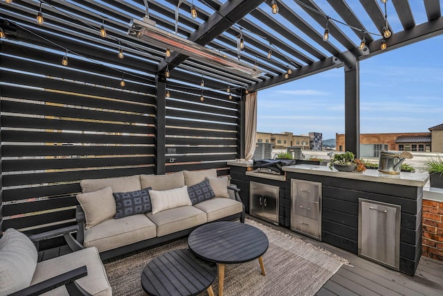 55 E Main St # 208, Chattanooga, TN 37408 - wooden terrace with a pergola, an outdoor hangout area, and an outdoor kitchen