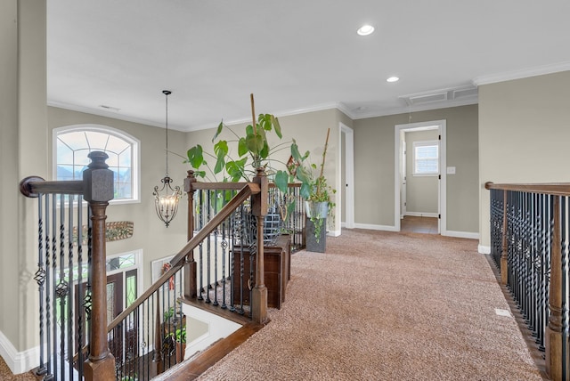 1607 Edgewater Ln, Clarksville, TN 37043 - corridor featuring an upstairs landing, carpet, baseboards, ornamental molding, and attic access