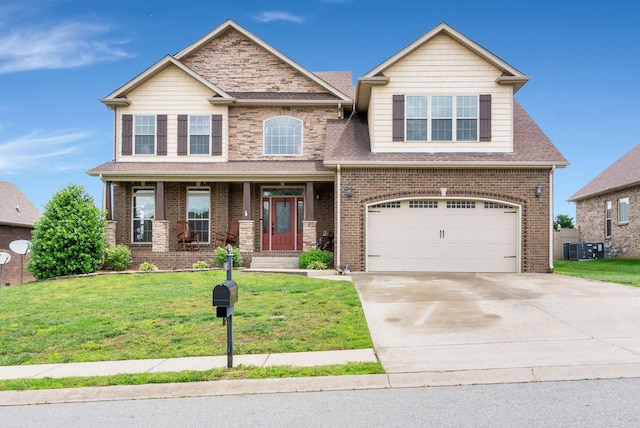 1607 Edgewater Ln, Clarksville, TN 37043 - craftsman-style home with a front yard, concrete driveway, an attached garage, brick siding, and central AC