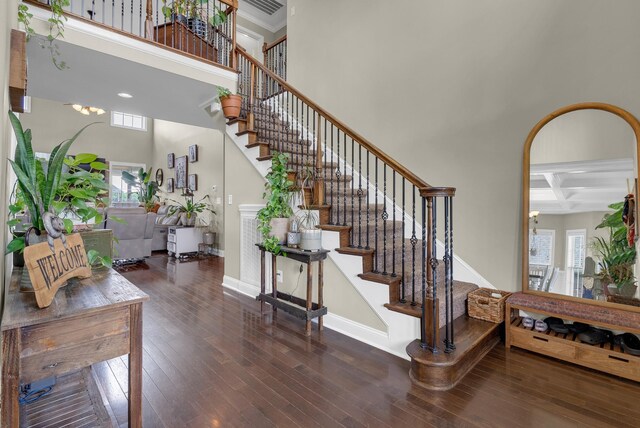 1607 Edgewater Ln, Clarksville, TN 37043 - stairs with a towering ceiling, coffered ceiling, hardwood / wood-style flooring, baseboards, and beamed ceiling