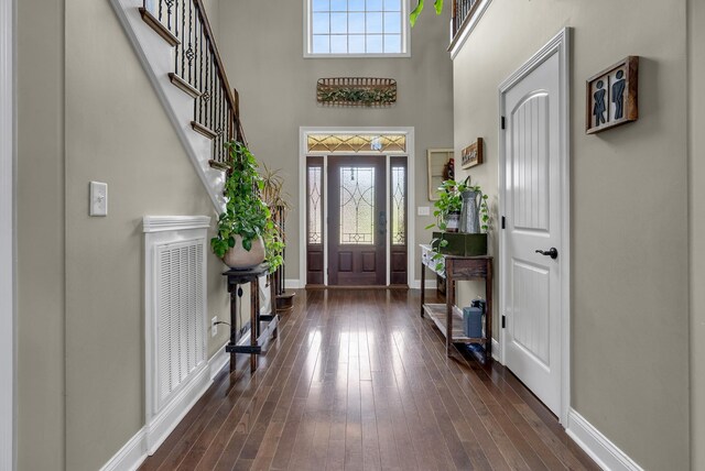 1607 Edgewater Ln, Clarksville, TN 37043 - entrance foyer featuring baseboards, dark wood-type flooring, and a high ceiling