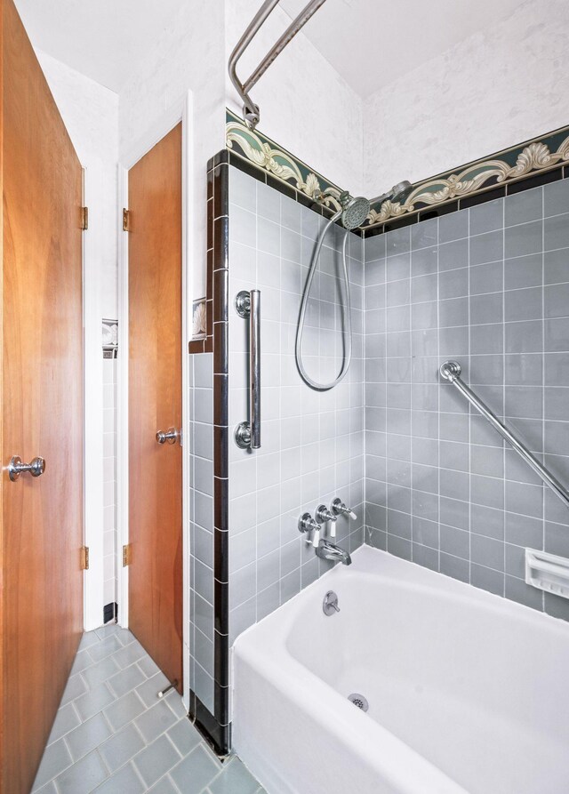 411 Tremont Dr, Murfreesboro, TN 37130 - bathroom with tile patterned flooring and tub / shower combination