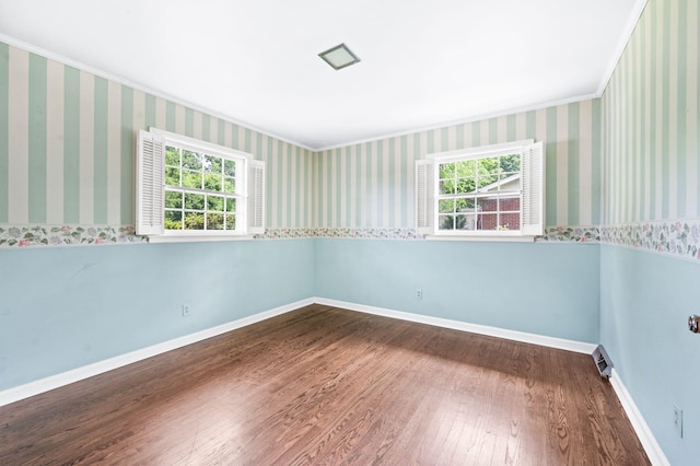 411 Tremont Dr, Murfreesboro, TN 37130 - unfurnished room featuring plenty of natural light, wood finished floors, ornamental molding, baseboards, and wallpapered walls