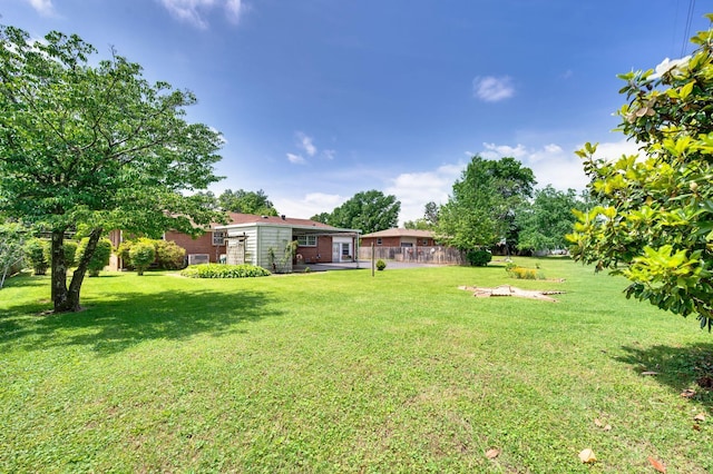 411 Tremont Dr, Murfreesboro, TN 37130 - view of green lawn featuring a patio area