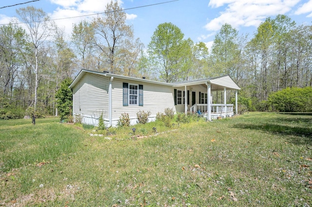 48 Enfield Dr, Beechgrove, TN 37018 - view of front of property with covered porch and a front yard
