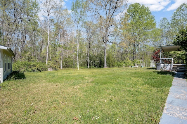 48 Enfield Dr, Beechgrove, TN 37018 - view of grassy yard featuring ceiling fan