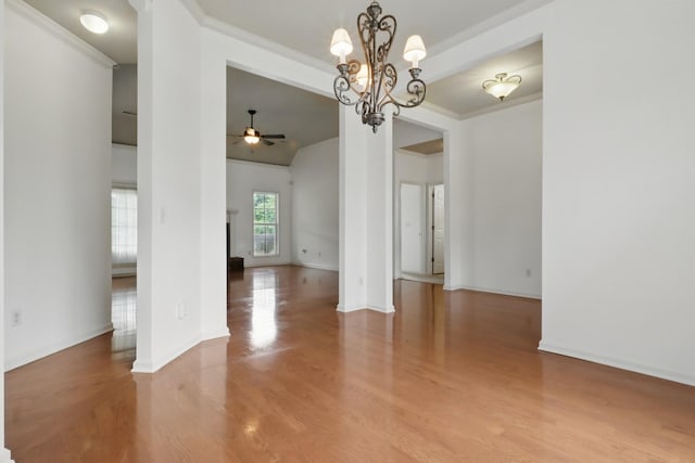 208 Sunnyside Dr, Chapel Hill, TN 37034 - spare room with light wood-style flooring, a ceiling fan, baseboards, a chandelier, and crown molding