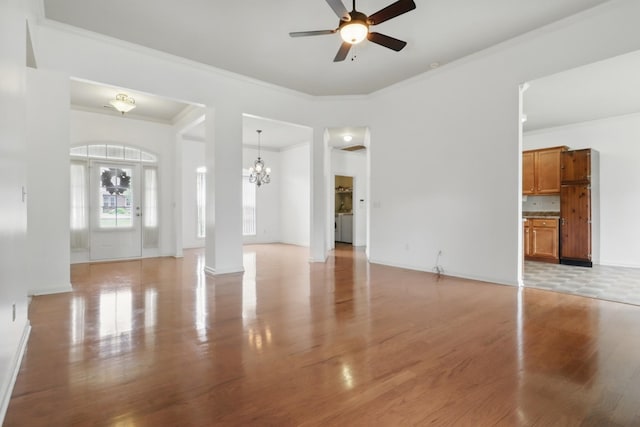 208 Sunnyside Dr, Chapel Hill, TN 37034 - unfurnished living room featuring crown molding, ceiling fan, light wood finished floors, and a chandelier