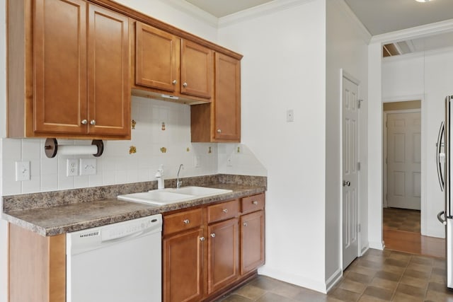 208 Sunnyside Dr, Chapel Hill, TN 37034 - kitchen featuring dishwasher, a sink, tasteful backsplash, brown cabinetry, and baseboards