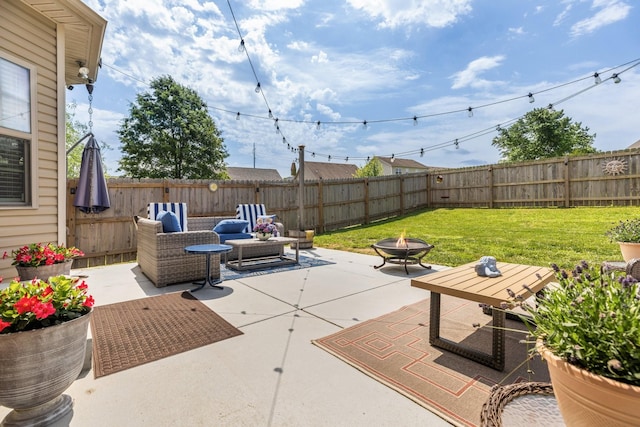 view of patio featuring an outdoor fire pit