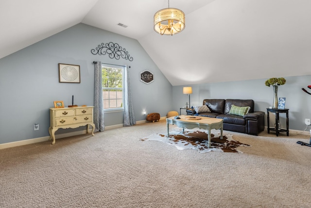 carpeted living room with vaulted ceiling and baseboards