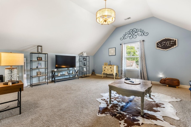 carpeted living area with vaulted ceiling and baseboards