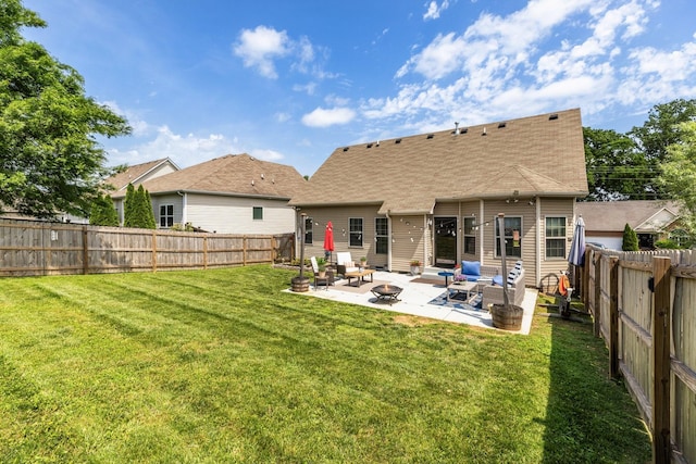 back of property with a patio