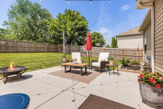 view of patio / terrace featuring a fire pit