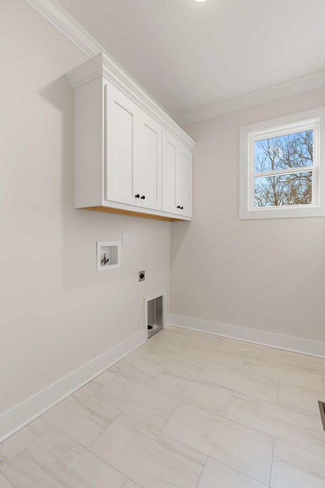 3101 Bluebird Rd, Lebanon, TN 37087 - clothes washing area with electric dryer hookup, light marble finish floors, crown molding, hookup for a washing machine, and cabinet space