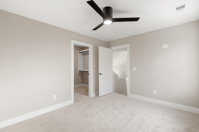 3101 Bluebird Rd, Lebanon, TN 37087 - unfurnished bedroom with carpet floors, a spacious closet, baseboards, a ceiling fan, and a closet