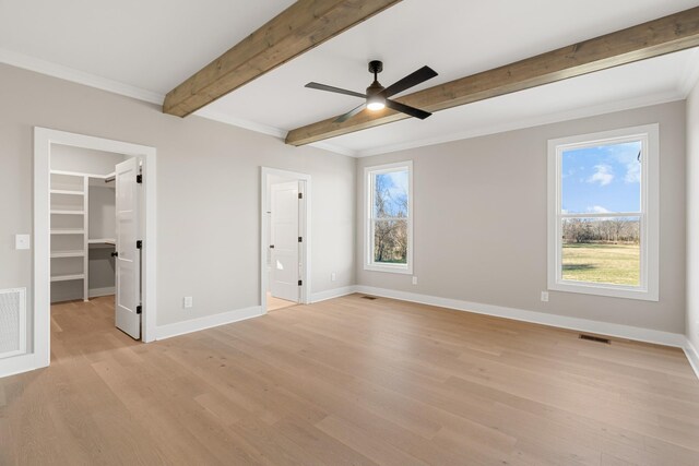 3101 Bluebird Rd, Lebanon, TN 37087 - unfurnished bedroom with light wood-style floors, multiple windows, baseboards, beamed ceiling, and ornamental molding