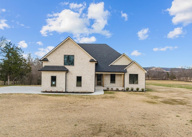 3101 Bluebird Rd, Lebanon, TN 37087 - view of front of house featuring brick siding and a shingled roof