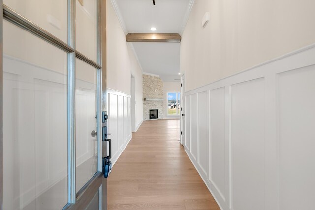 3101 Bluebird Rd, Lebanon, TN 37087 - hallway featuring a decorative wall, light wood-type flooring, crown molding, and beam ceiling