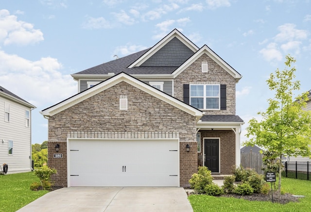 1080 Laurel Valley Ln, Mount Juliet, TN 37122 - craftsman-style house with concrete driveway, stone siding, an attached garage, and roof with shingles