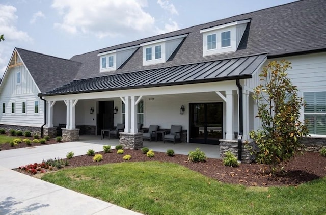 1080 Laurel Valley Ln, Mount Juliet, TN 37122 - rear view of property with a standing seam roof, covered porch, roof with shingles, a yard, and metal roof