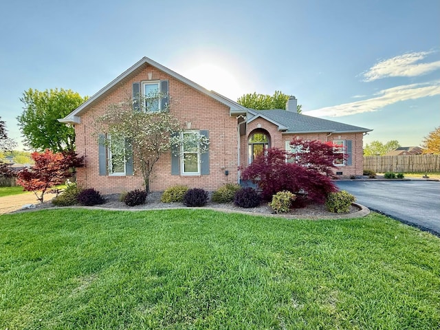 210 Primrose Ln, Lebanon, TN 37087 - view of front facade featuring brick siding and a chimney