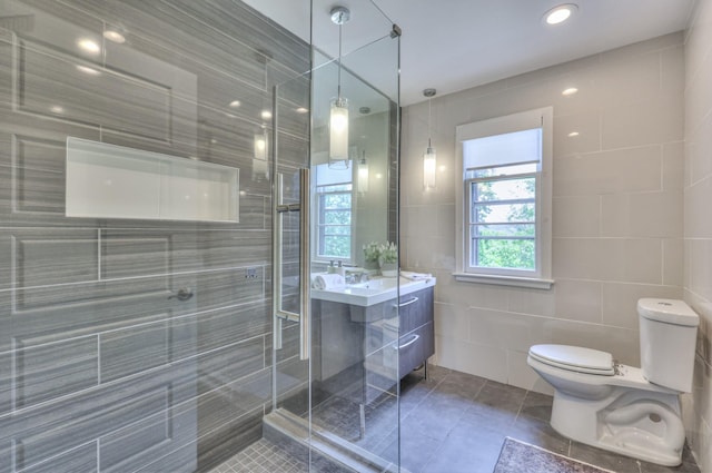 1702 Old Hickory Blvd, Brentwood, TN 37027 - bathroom with tile walls, vanity, a stall shower, and tile patterned flooring