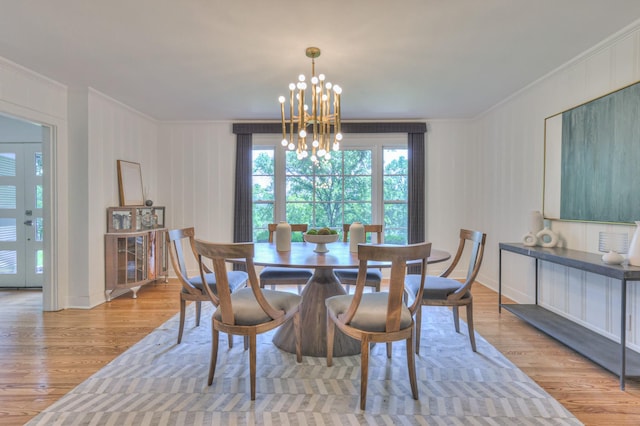 1702 Old Hickory Blvd, Brentwood, TN 37027 - dining area featuring crown molding, wood finished floors, and a chandelier