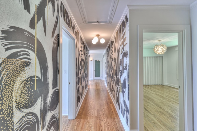 1702 Old Hickory Blvd, Brentwood, TN 37027 - corridor featuring wood finished floors, attic access, crown molding, and a chandelier