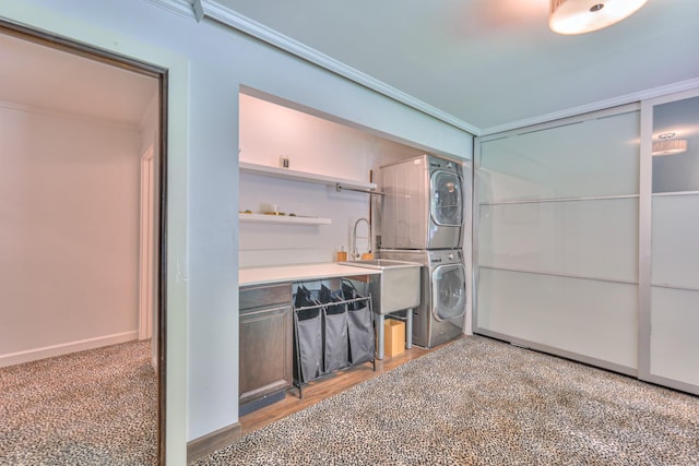 1702 Old Hickory Blvd, Brentwood, TN 37027 - washroom with stacked washer / dryer and ornamental molding