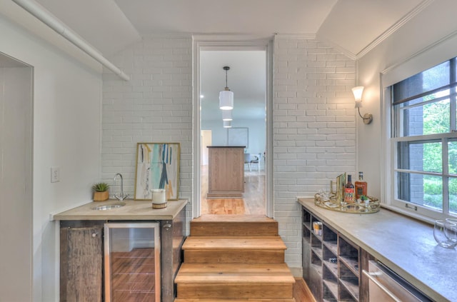1702 Old Hickory Blvd, Brentwood, TN 37027 - indoor bar featuring wine cooler, vaulted ceiling, wood finished floors, healthy amount of natural light, and stairs