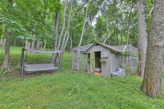 1702 Old Hickory Blvd, Brentwood, TN 37027 - view of green lawn featuring exterior structure and an outbuilding