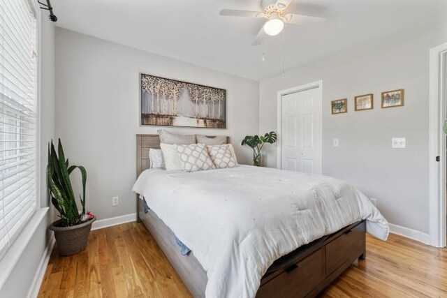 210 Highland Trl, Estill Springs, TN 37330 - bedroom with baseboards, light wood finished floors, a ceiling fan, and a closet