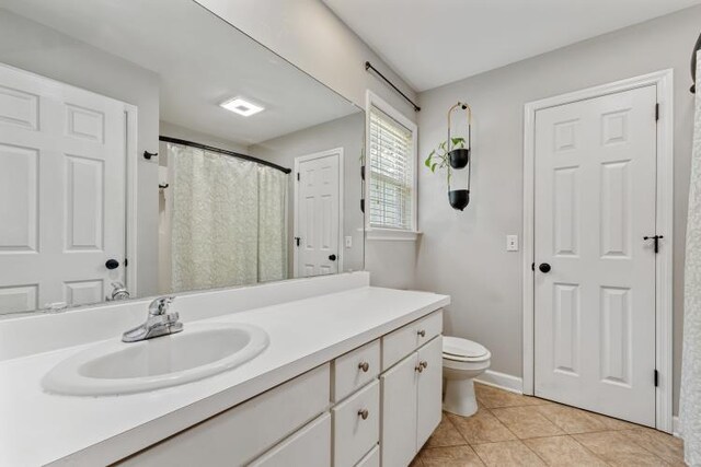 210 Highland Trl, Estill Springs, TN 37330 - bathroom with vanity, toilet, and tile patterned floors