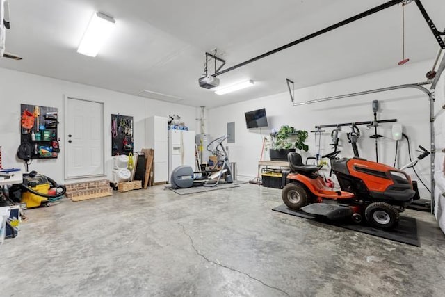210 Highland Trl, Estill Springs, TN 37330 - garage featuring a garage door opener and electric panel
