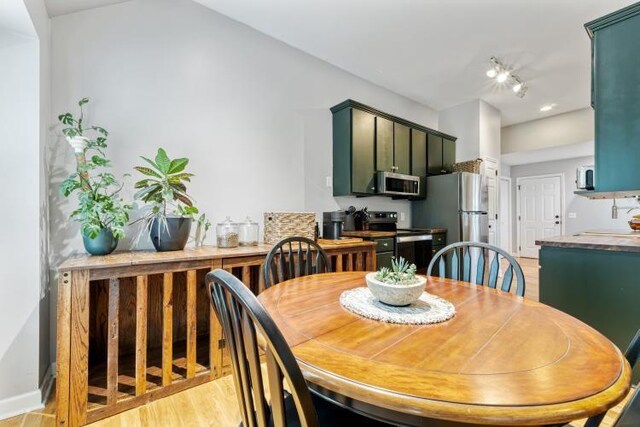 210 Highland Trl, Estill Springs, TN 37330 - dining room featuring light wood-type flooring and baseboards