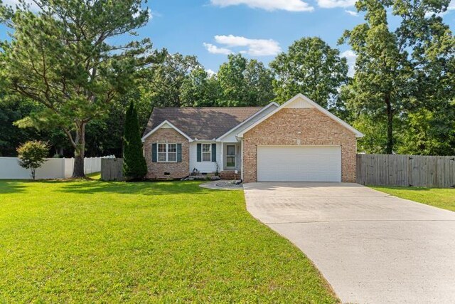 210 Highland Trl, Estill Springs, TN 37330 - view of front of home with driveway, brick siding, a garage, and crawl space