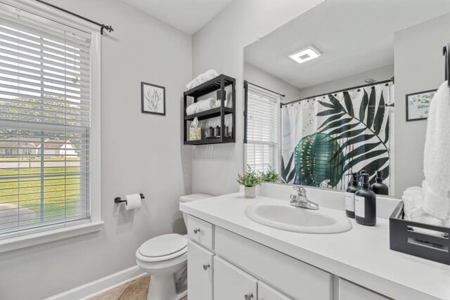 210 Highland Trl, Estill Springs, TN 37330 - full bathroom with vanity, toilet, baseboards, and tile patterned flooring