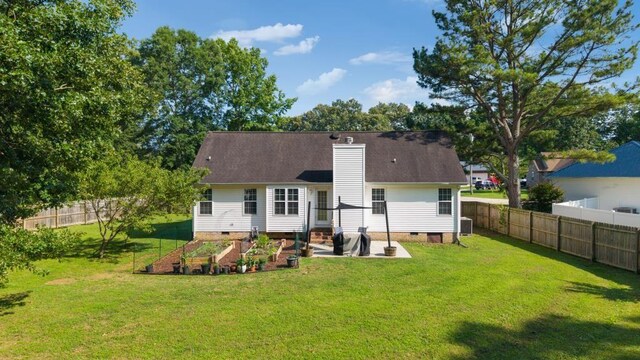 210 Highland Trl, Estill Springs, TN 37330 - rear view of property featuring crawl space, a garden, a chimney, entry steps, and central air condition unit